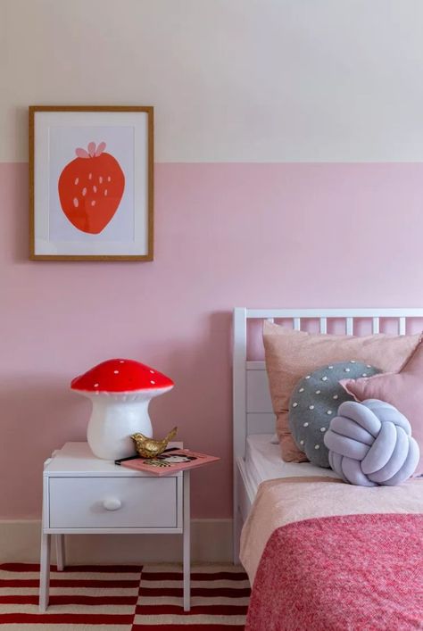 A candy pink border gives this cheerful kids room from Eklektik Studio a lively spring feel that is accented with pops of strawberry pink and red that adds depth and makes it work year-round. #pinkbedroom #paintcolors #springdecor #springtablescape #springpaintcolors #homedecorideas #thespruce Spring Paint Colors, Girls Bedroom Red, Pink Bedroom Furniture, Pink Bedrooms, Bedroom Red, Toddler Rooms, Twin Bed Frame, Wood Bed Frame, Red Rooms