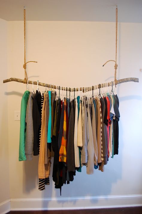 Clothing Rack Hanging From Ceiling, Diy Hanging Wardrobe Ideas, Clothes Hanging From Ceiling, Diy Wall Clothing Rack, Stick Clothing Rack, Hang Clothes On Wall Ideas, Diy Wall Clothes Rack, Clothing Rack From Ceiling, Ceiling Hanging Clothes Rack