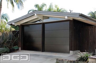 Mid Century Garage Door for a Cliff May's Modern Rancho Style Home in Long Beach - modern - garage and shed - los angeles - Dynamic Garage Door Mid Century Garage Door, Mid Century Garage, Garage Additions, Carriage Style Garage Doors, Mid Century Modern Ranch, Modern Nest, Waterfront House, Custom Garage Doors, Wood Garage