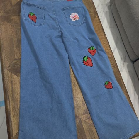 Cakeworthy Stretch Cotton And Spandex Unisex Embroidered Strawberry Shortcake Collection Jeans Size 40 Brand New Has Stretch (40 Waist Flat) Add Some Strawberry Shortcake Nostalgia To Your Closet With Our Berry Cool Women’s Strawberry Patch Denim Jeans! Featuring Strawberry Patches, Picked Straight Off The Vine, A Berry Red Waist Tab, And An Iconic Strawberry Shortcake Patch On The Back Pocket, These Flared Jeans Pay Homage To The Best Parts Of 90’s Fashion. Made From Comfortable Cotton, They Ar Strawberry Pants, Patch Denim Jeans, Embroidered Strawberry, Patched Denim Jeans, Cool Women, Patch Denim, Strawberry Patch, Denim Patches, Flared Jeans