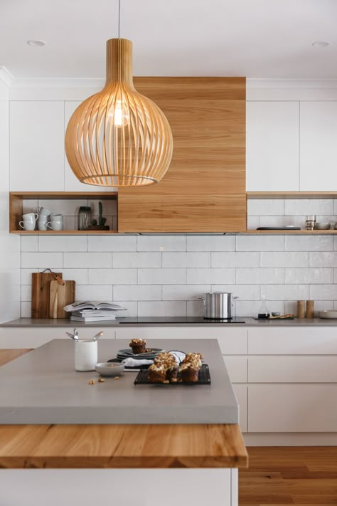 Grand modern. Featuring a solid Blackbutt timber rangehood in a horizontal grain with American Oak solid timber shelving on either side. #kitchendesign #kitchens #modern #timber #caesarstonebenchtops #subwaytile  #interiordesign #spacecraft #spacecraftjoinery #everythingwedoisbuiltaroundyou Wood Shelves Kitchen, Glass Shelves In Bathroom, Scandi Kitchen, White Cabinetry, Quartz Design, Kitchen Room Design, Kitchen Trends, Reno Ideas, Updated Kitchen