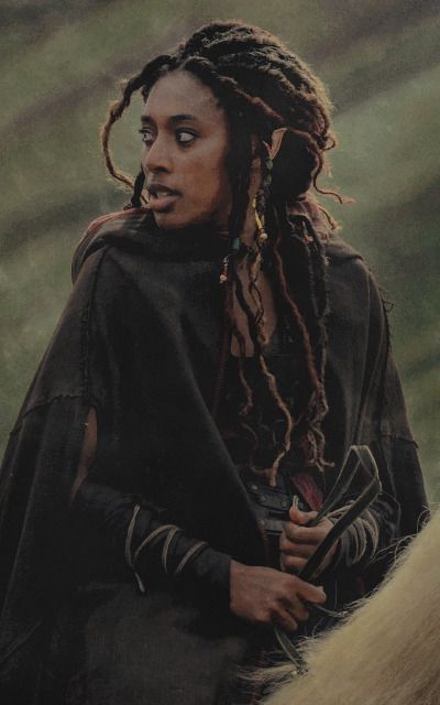 Elf Cosplay Black Women, D&d Witch Character, Poc Fantasy Aesthetic, Black Woman Character Inspiration, Shield Maiden Aesthetic, Irish Woman Aesthetic, Black Elf Aesthetic, Black Dnd Character Female, Medieval Black Woman