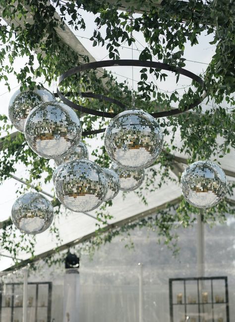 Disco Ball Ceiling Wedding, Disco Ball Ceiling Decor Wedding, Hanging Disco Balls Wedding, Wedding Tent With Disco Balls, Wedding Tent Disco Ball, Disco Ball And Chandelier Wedding, Disco Balls And Chandeliers Wedding, Green White Decor, Wedding Tent Lighting