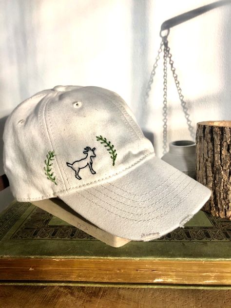 Casual Embroidered Hat For Gift, Cathartic Hat Embroidered, Hand Embroidery Hats Baseball Caps, Embroidered Carhartt Hat, Hand Embroidered Hats Baseball Caps, Goat Embroidery, Goat Embroidery Pattern, Embroidered Hats Ideas, Chicken Hats