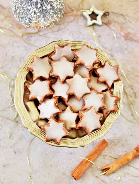 These 4-ingredient Zimtsterne (cinnamon stars) aka German Christmas cookies are lightly spiced and chewy, and perfect for the holidays. Plus, the recipe is naturally dairy-free, gluten-free, and now egg-free too! #zimtsterne #cinnamonstars #starcookies #Germancookies #Christmascookies | elavegan.com Star Christmas Cookies, Cinnamon Star Cookies, Dairy Free Deserts, Vegan Royal Icing, Meringue Icing, Cinnamon Stars, Dessert Biscuits, Hazelnut Meringue, German Christmas Cookies