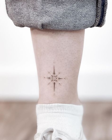 Nina Post | Fineline Tattoos on Instagram: “Tiny star ornament on her shinbone.” Compass Tattoo Minimal, Ornamental Compass Tattoo, Small Compass Tattoo Women, Ornamental Star Tattoo, Dainty Compass Tattoo, Minimal Compass Tattoo, Tiny Compass Tattoo, Star Compass Tattoo, Fine Line Compass Tattoo