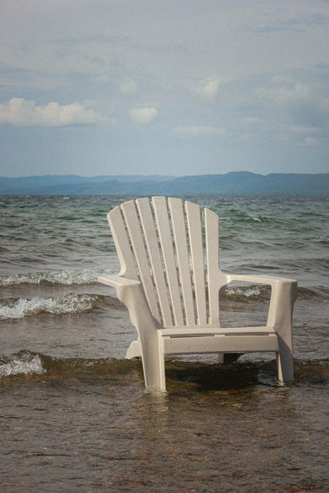 A beach chair in the water #beach #lake #aesthetic #ontario #chair #photography #canada #2022 Beach Chairs Aesthetic, Beach Chair Aesthetic, Chair Portrait, Boardwalk Theme, Sarah Core, Playlists Spotify, Lounge Aesthetic, Pearl House, Chair Photography