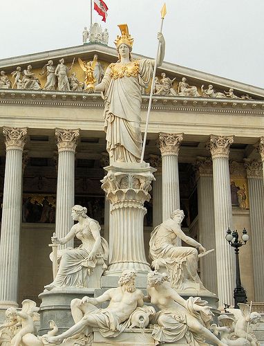 Statue of Athena (Pallas-Athene Fountain) in front of Austrian Parliament Vienna Austria  Austrian Parliament Building in background Gable with allegorical statues and Emperor Franz Joseph I in the center Austrian Parliament, Statue Of Athena, Ancient Greece Aesthetic, Holy Spirit Tattoo, Greece Architecture, Greece Mythology, Ancient Athens, Spirit Tattoo, Franz Joseph