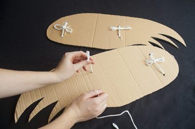 How to Make Wings for a Bird Costume. Wings are a main component of a bird costume, and an easy element to make. The most important parts of a bird wing are the shape and texture. A feathery element attached to the right shape creates a very authentic look. Look at pictures of the specific bird you are making wings for as inspiration for your... Bird Wings Diy, Bird Costume Kids, How To Make Wings, Eagle Costume, Bird Wings Costume, Wings Diy, Bird Tattoo Men, Easy Bird, Owl Wings