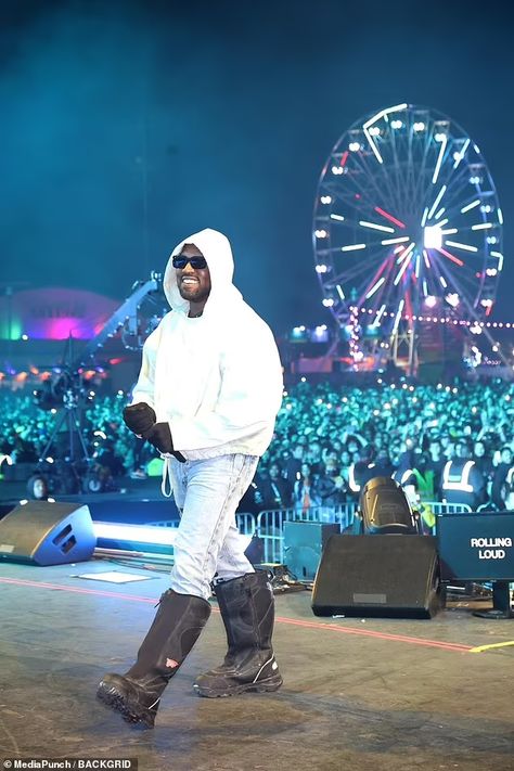 Kanye West makes surprise cameo at Rolling Loud California concert and performs five songs | Daily Mail Online Rolling Loud California, Kanye West Performing, Kanye West Concert, White Hooded Sweatshirt, Rolling Loud, Light Jeans, Black Gloves, Kanye West, Daily Mail