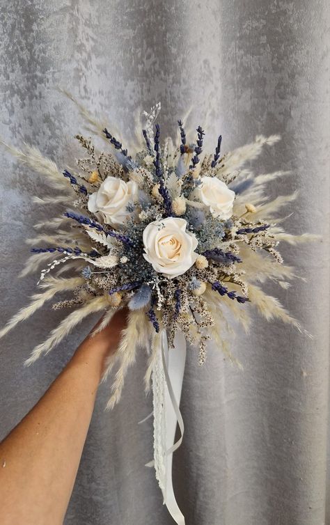 This Wedding Bouquets item by AtelierAnnaHandmade has 34 favorites from Etsy shoppers. Ships from Germany. Listed on Jan 4, 2024 Blue And Cream Wedding Bouquet, Western Wedding Bouquets Blue, Dusty Blue And Champagne Wedding Colors, Champagne And Blue Wedding Colors, Blue Tan Wedding, Champagne And Blue Wedding, Beige Wedding Theme, Bridal Bouquet Lavender, Blue Boho Wedding