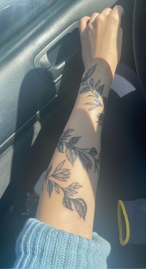 Hand Tattoos Wrap Around, Wrap Around Arm Tats, Half Sleeve Vine Tattoos For Women, Wrap Around Vine Tattoos Forearm, Vine Leaves Tattoo Arm, Wrap Forearm Tattoo Women, Rap Around Vine Tattoo Arm, Floral Vine Wrapped Around Arm Tattoo, Initial Cover Up Tattoo