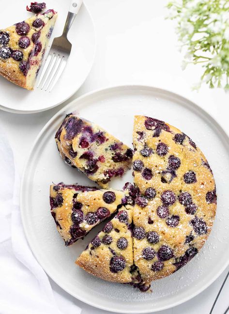 Blueberry Breakfast Cake is loaded with fresh blueberries, baked, and poked with holes to be saturated with a warm sugary milk mixture for a super moist and rich cake. Then, it's dusted with confectioners' sugar. This type of cake, known as a poke cake, is the perfect way to add flavor and extra moisture to each bite. And, don't save this cake just for breakfast; it is also a delicious snack or dessert. Lemon Breakfast Cake, Lemon Breakfast, Gooey Cake, Fresh Strawberry Cake, Blueberry Breakfast Cake, Dairy Free Treats, Rich Cake, I Am Baker, Blueberry Breakfast