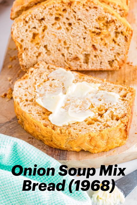 A slice of buttered onion soup mix bread on cutting board with rest of loaf. Onion Soup Bread Recipe, French Onion Soup Bread, Bisquick Quick Bread Recipes, Onion Soup Mix Bread, Onion Soup Bread 1968, Bread To Serve With Soup, Bread Machine Beer Bread, Old Fashioned Bread Recipes, Homemade Bread For Soup