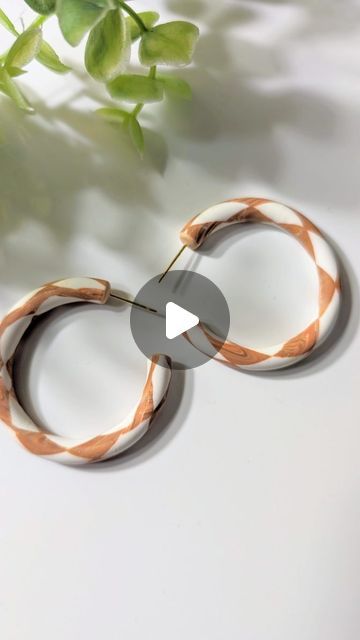 Saheli Paul on Instagram: "Part 2: Let's make hoop earrings using a checkerboard patterned polymer clay slab. 🤍🤎  This is my first attempt at making hoops using this technique. They did not turn out the best, but I will keep practicing this technique.  Love patterned hoops!!   #polymerclayhoops #polymerclayearrings #eotd #processvideo #polymerclayart #artistoninstagram" Hoop Earrings Polymer Clay, Polymer Clay Hoop Earrings Diy, Make Hoop Earrings, Polymer Clay Slab, Palmer Clay, Hoop Earrings Diy, Keep Practicing, Love Text, Checkerboard Pattern