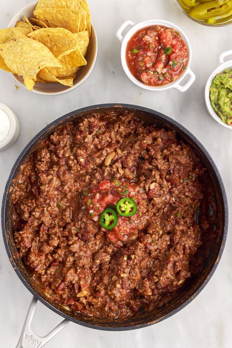 Delicious and versatile ground beef taco filling is perfect for tacos, burritos, nachos and more. Beef Taco Filling Recipe, Salsa Ground Beef Recipe, Taco Meat And Refried Beans, Beef Taco Filling, Tacos With Refried Beans And Ground Beef, Beef And Bean Tacos, Nacho Beef Recipe, Taco Filling Recipe, Ground Beef Refried Beans