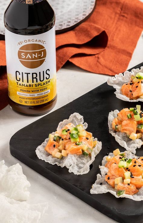 Spice up your appetizer game with this fiery Spicy Citrus Tamari Salmon on Rice Paper Chips! Sushi-grade salmon is the key to this recipe, but the recipe can also be customized to match your personal taste! #AppetizerIdea #SeafoodRecipe #SalmonRecipe Rice Paper Recipes With Salmon, Salmon Tartare Plating, Salmon Rice Paper Bites, Rice Paper Salmon Bites, Rice Paper Chips, Rice Paper Sushi, Party Food Catering, Crispy Rice Paper, Salmon Appetizer Recipes