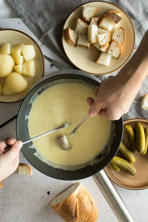 There isn't much comfort food to top a Traditional Swiss Cheese Fondue. This recipe comes straight from Switzerland! Click through for the best, most authentic fondue you've ever had! Swiss Cheese Fondue, Swiss Fondue, Swiss Cuisine, Swiss Recipes, Fondue Recipes, European Food, Swiss Cheese, Melted Cheese, Fun Snacks