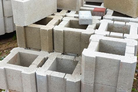 The Difference Between Cement, Cinder, and Concrete Blocks Concrete Blocks Ideas Furniture, Cement Block House, Hempcrete Blocks, Cinder Block Shelves, Expansion Joints In Concrete, Concrete Building Blocks, Cinder Block House, Concrete Masonry Unit, Cement Blocks