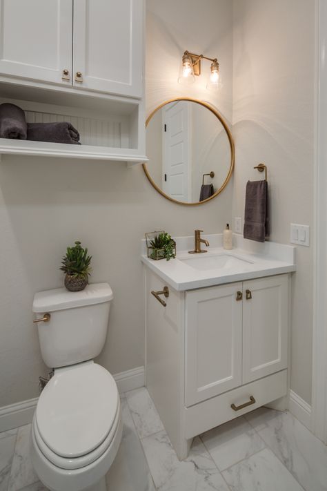 Restroom With Gold Fixtures, Bathroom White Cabinets Gold Hardware, Small Bathroom Gold Hardware, White Gold Restroom, All White And Gold Bathroom, Small Bathroom Ideas With Gold Fixtures, Gold Theme Bathroom Ideas, White And Gold Half Bath, Gold And White Small Bathroom