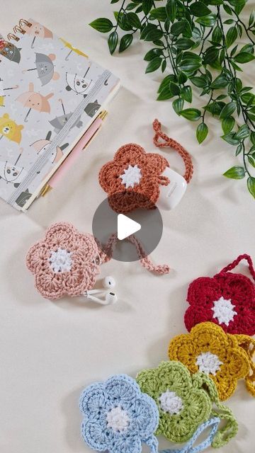 Crochet by Bethany on Instagram: "Introducing the must-have accessory for all your small essentials - the flower pouch! Never lose your earbuds, earphones, lip balms, or loose change again with our convenient and stylish pouches. With a loop for attaching to bags and handles, you can take your essentials with you wherever you go. Plus, with 6 vibrant colours to choose from, you can match your pouch to your mood or outfit. Don't miss out on this adorable and practical accessory - get your flower pouch today!

And for all the crochet girlie's you'll find the pattern in my etsy shop! For a 10% discount code message me ❤️
.
.
.
.
.
.
.
.
.
.
#earbuds #earbudswireless #earphones #lipbalm #lipgloss #accessories #pouch #organise #bagorganiser" Crochet Ear Bud Holder, Earbuds Pouch Crochet, Crochet Earphone Pouch Free Pattern, Crochet Ear Pods Case, Crochet Samsung Buds Case, Flower Pouch Crochet Pattern, Crochet Earphone Holder, Crochet Ear Bud Holder Pattern Free, Flower Pouch Crochet