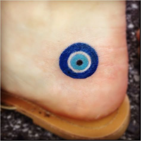 Hamsa or Blue Eye, a Turkish symbol to ward off the evil ~ I have one of these on my fridge that I got in Turkey -MindyFranks Greek Evil Eye Tattoo, Evil Eye Tattoo, Evil Tattoo, Hamsa Tattoo, Blue Tattoo, Greek Evil Eye, Eye Tattoo, Symbolic Tattoos, It Goes On