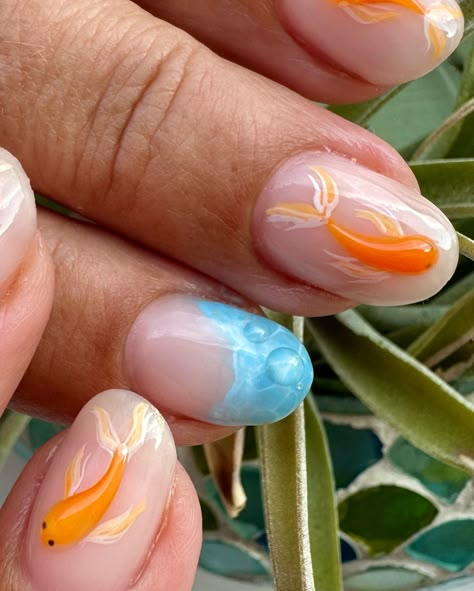 Just some goldfish 🤷🏼‍♀️🌊🐠 . . . #nails #nailinspo #nailsnails #fishnails #goldfishnails #3dnailart #waternails #trendynails #summernails Nail Ideas Powder, Goldfish Nail Art, Koi Fish Nail Design, Fish Inspired Nails, Koi Pond Nails, Fish Nails Designs, Goldfish Nails, Koi Fish Nails, Fish Nail Art