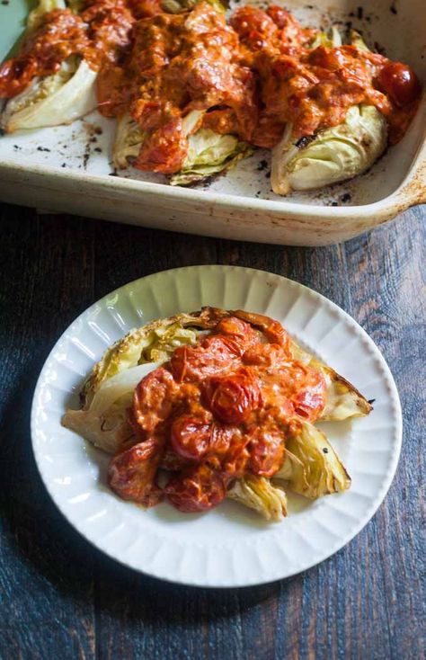 This roasted cabbage with creamy tomato sauce reminds me of a decadent pasta dish. The flavorful tomato sauce tops the sweet roasted cabbage for a great vegetarian meal. Great Vegetarian Meals, Best High Heels, Cabbage Steaks, Roasted Cabbage, Vegetarian Life, Cooked Cabbage, Creamy Tomato Sauce, Tomato Sauce Recipe, Whole30 Recipes