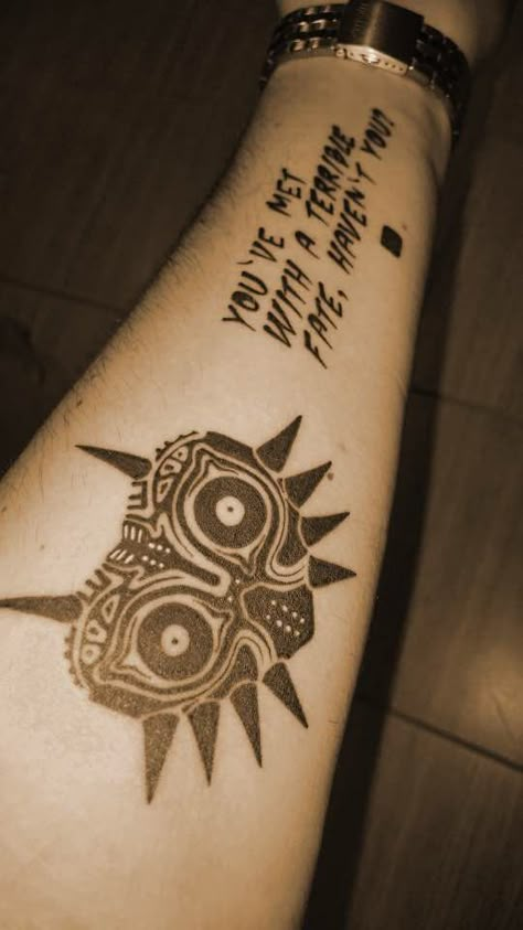 Majora's Mask Tattoo Zelda Tattoo Sleeve, Majoras Mask Tattoo, Majora's Mask Tattoo, Zelda Tattoo Ideas, Nerdy Tattoos, Zelda Tattoo, Hand And Finger Tattoos, Elbow Tattoos, Mask Tattoo