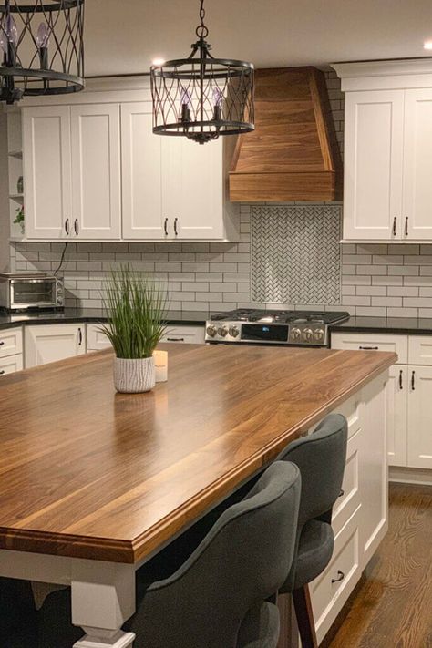 This modern kitchen with a rich wood island countertop and white tile backsplash perfectly compliments a minimalist style. Get superior craftsmanship from Excelsior Wood Products' detailed custom fabrication services and choose from racks of reclaimed wood. Kitchen Wood Top Counter, Farmhouse Kitchen Butcher Block Island, Green Island Butcher Block Top, Butcher Block Island With Sink, Butcher Block And Granite Countertops, Island With Wood Countertop, Kitchen Island Wood Countertop, Kitchen Wood Countertop, Butcher Block Countertops White Cabinets