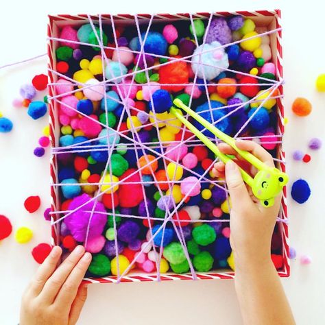 Love this fun fine motor activity @cintaandco created 💕 To set it up she simply wrapped wool/yarn around a shoe box lid to create the web… Finger Gym, Preschool Fine Motor, Fine Motor Skills Activities, Motor Skills Activities, Skills Activities, Fine Motor Activities, Gross Motor, Motor Activities, Gross Motor Skills