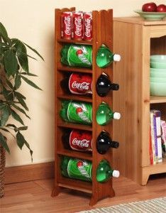 2+liter+bottle+storage | Liter Bottle Rack I need something like this next to my fridge More Diy Bottle Rack, Bottles Craft, 2 Liter Bottle, Drink Storage, Honey Diy, Shed To Tiny House, Diy Workshop, Bottle Storage, Bottle Rack