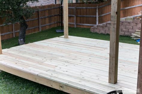 Floating deck how-to Build A Floating Deck, Concrete Deck Blocks, Deck And Pergola, Building A Floating Deck, Concrete Deck, Laying Decking, Floating Deck, Building A Pergola, Deck Construction