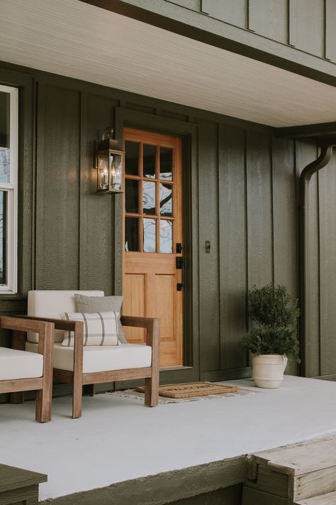 Front Porch Board And Batten, Siding Ideas Exterior Board And Batten, Board And Batten Green Exterior, Painted Wood House Exterior, Hunter Green Home Exterior, Green House Front Porch, Brown House Front Porch, Green Siding House Exterior, Green Porch Paint