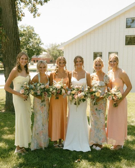 I hope colorful wedding days are here to stay 😌 especially the whimsy florals & mix and match bridesmaid dresses 🧡 #iowaweddingphotographer #desmoinesweddingphotographer #desmoineswedding #weddingcolorscheme #colorfulwedding #iowaphotographer Floral Mix Match Bridesmaid Dresses, Mix N Match Bridesmaid Dresses, Summer Mismatched Bridesmaid Dresses, Mix Matched Bridesmaid Dresses, Mix Match Bridesmaid Dresses, Mix And Match Bridesmaid Dresses, Floral Bridesmaid Dresses Mismatched, Mix Match Bridesmaids, Floral Bridesmaid Dresses