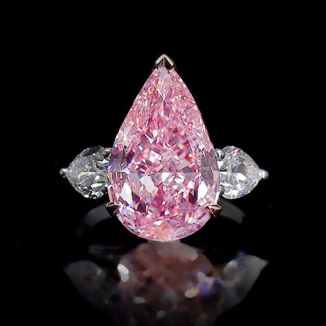 Graff on Instagram: “Symphony in pink. . 6.79 carat Fancy Vivid Pink pear shape diamond ring #graffdiamonds #pinkdiamondring #paris” Coloured Stone Rings, Pink Diamonds Engagement, Graff Diamonds, Pink Diamond Engagement Ring, Billionaire Luxury, Pear Shaped Diamond Ring, Anna Kournikova, Pink Diamond Ring, Pink Stones