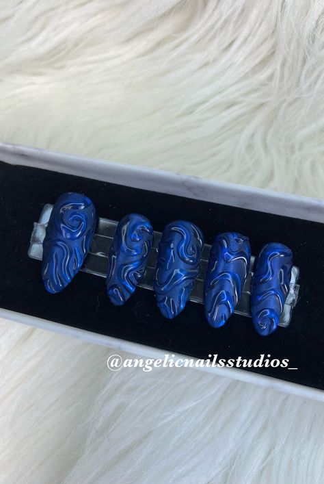 Hand Painted 3D Deep Blue Chrome Press Ons Hand painted dark blue chrome press ons with 3D clear gel Designed and painted by a license nail technician.  ~WITH KIT~ KIT INCLUDES- - Mini nail file -Nail glue - Mini orange wood stick - Pack of 15 reusable clear strong nail tape - 2 alcohol pads  - Clear press on case to hold designs - Small glitter butterfly bag HOW TO MEASURE 1. Place clear tape over nail 2. Mark with a pen each side of nail 3. Remove clear tape and place on millimeter side of a ruler 4. Match to sizes on picture 5. In personalization part of order, write right hand thumb to right hand pinky, then left hand thumb, to left pinky. EXAMPLE: Right hand: 3,8,6,8,10 Left hand: 3,8,6,6,10 --------------------------WRITE YOUR SIZE IN PERSONALIZATION-------------------------- HOW TO Black Nails With Blue Chrome, Blue Extra Nails, Blue Blooming Nails, Turquoise Nails Chrome, Dark Blue Nails With Charms, Blue Nail Extensions, Blue Clear Nails, Blue Blooming Gel Nails, Light Blue Aura Nails