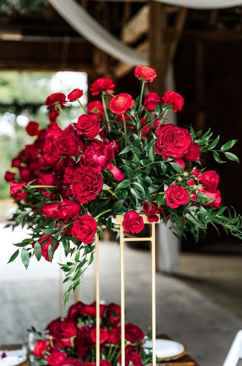 Tall Red Flower Arrangements, Red Rose Centrepiece, Red Roses And Eucalyptus Centerpiece, Red Roses Aisle Decor, Red Roses And Greenery Centerpiece, Red Flower Decoration Wedding, Red Floral Centerpieces Wedding, Red Rose Wedding Florals, Wine Red Wedding Theme Table Settings