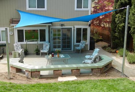 U Shaped Bench made out of brick. Sun Shade Sails create an instant patio. #Patio #Bench #DIYBench #InexpensivePatio #GetOrganizedDFW #GetOrganized #DallasOrganizer #IloveOrganizing  http://DallasOrganizer.com Patio Sails, Shade Sail Installation, Ideas Terraza, Sun Sail, Small Pergola, Patio Sun Shades, Backyard Shade, Patio Shade, Sun Sail Shade