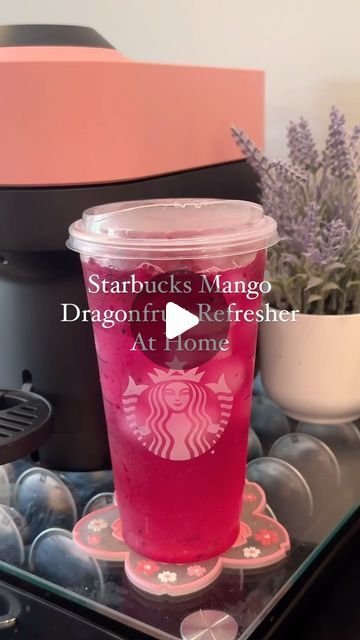 Brookelyn  Meyer ☕️✨🌸 on Instagram: "Starbucks Mango Dragonfruit Refresher At Home 🥭  This is now one of my favorite refreshers at home!! Super delicious, and very easy to make!  Recipe:  🥭 1 tbsp mango syrup @kyyachocolate (code BROOKELYNKYYA10 for $$ off!) 🥭 dragonfruit chunks from @target  🥭 lemonade 🥭 white grape juice 🥭 ice  ENJOY and follow me @brookelynlikesespresso for more on TikTok & IG!  #starbucksrefreshers #refresher #starbucksmangodragonfruitrefresher #mangodragonfruitrefresher #summerdrinks #refreshingdrinks #starbucksathome" Dragonfruit Juice Recipe, Mango Dragon Fruit Refresher Recipe, Starbucks Dragonfruit Refresher, Refreshers At Home, How To Make Starbucks Drinks At Home, Mango Dragonfruit Refresher Recipe, Starbucks Mango Dragonfruit Refresher, Refresher At Home, Mango Dragonfruit Refresher