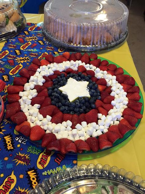 Superhero baby shower captain America fruit tray Baby Shower Ideas For Boys Themes, Marvel Baby Shower, Captain America Birthday Party, Seventh Birthday, Baby Shower Ideas For Boys, Captain America Birthday, Baby Shower Images, Modern Baby Shower Games, Superhero Baby Shower