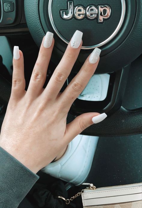 White Nail With Diamonds, Full White Nails With Designs, White Nails With Gems On Ring Finger, Short White Nails With Gems, Nails White With Gems, White With Design Nails, All White Nails With Rhinestones, Neutral Nails With Gems, White Nails With Gems Rhinestones