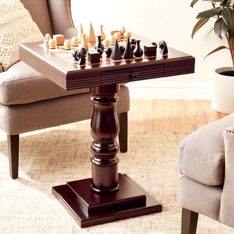 A great way to accessorize your home is to invest in furniture that’s timeless, adaptive and elegant. Chess Board Tables are exactly that! These handy game tables can double up as great end furniture. We’ve got you a list of the most coveted chess board tables that are sure to have you sold on the idea!  Chess Board Tables, Chess Board Tables Furniture, Outdoor Chess tables, Chess set tables, Elegant Chess board tables, Adult Games, Board Games, Chess, Chess boards, Chess Sets, Chess tables, Chess Board Table, Pedestal Dining Room Table, Outdoor Shelves, Backgammon Table, Living Room Decor Furniture, Cherry Color, Chess Table, Light Colored Wood, Furniture Table