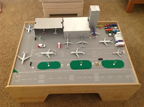 Airport: Kids playtable converted into an airport -all for my plane loving boy!! Kids play table Diy Airport, Airport Theme, Model Train Table, Kids Play Table, Airplane Crafts, Airplane Decor, Toy Trains Set, Play Table, Small World Play