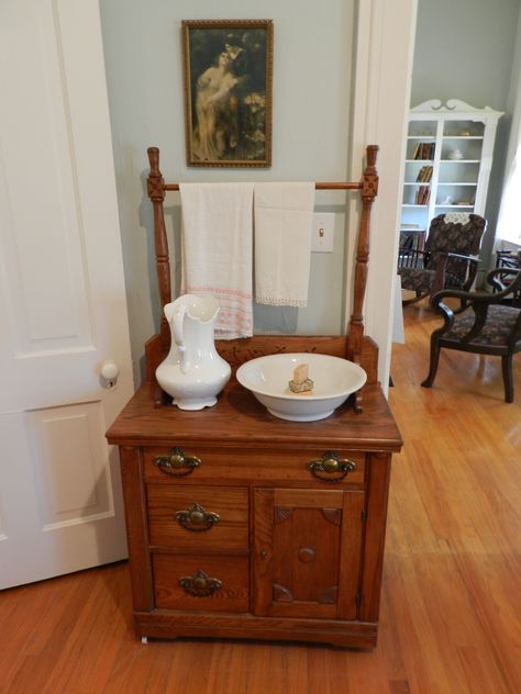 Washstand.  The pitcher and bowl were used before the days of indoor plumbing. Starcke House, Junction City, KS Pitcher And Basin Decor, Pitcher Decor, Painted Brick House, Dry Sink, Wash Stand, Build A Closet, Small Bathroom Decor, Country House Decor, Wash Basin