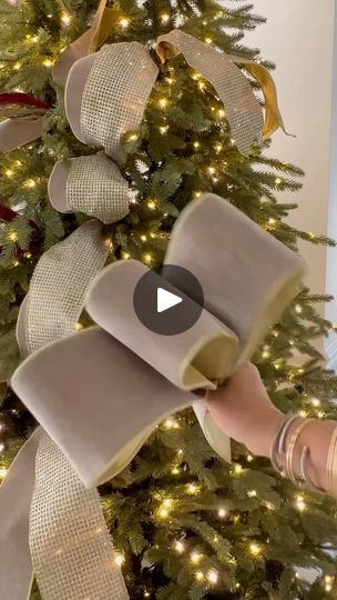 3.5K views · 2.2K reactions | There are so many ways to put ribbon on the tree. Here are three ways!  Comment “ribbons” so you can receive a link to our ribbon collection. 

#ribbon #ribbons #ribbonsandbows #holidaydecor #treetrimming #christmastree #christmastreedecorating #305decoliving #holidayseason #holidaydecorating | Maria Aleman All Ribbon Christmas Tree, Wide Christmas Tree Ribbon, Ribbon Crafts For Christmas, Bows For Tree Toppers, How To Put Burlap On Christmas Tree, How To Make A Bow For A Christmas Tree, Ribbon Filler For Christmas Tree, How To Make A Ribbon Tree Topper, How To Do Christmas Tree Ribbon