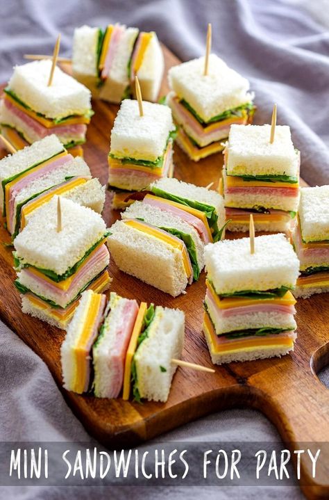 Mini sandwiches make a delightful treat for any occasion, from kids' lunchboxes to brunch gatherings, parties, baby showers, or picnics. Mini Sandwich Board, Recipes By Ingredients, Easy To Make Appetizers, Party Sandwiches, Sandwich Board, Mini Sandwiches, Kids Lunchbox, Small Plates, Yummy Appetizers