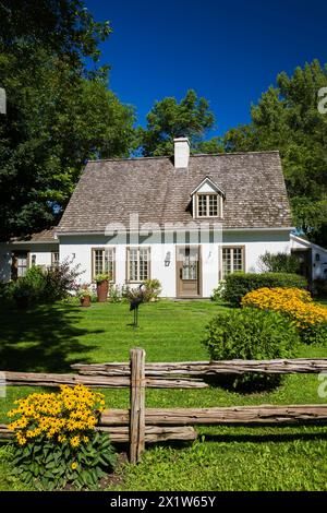 Old circa 1886 Canadiana cottage style home with white stucco cladding and cedar wood shingles roof in spring Stock Photo - Alamy Shingles Roof, Cedar Shingle Roof, Shingle House, Cottage Style Home, Wood Shingles, Cedar Shingles, Roof Shingles, Cedar Wood, Cottage Homes