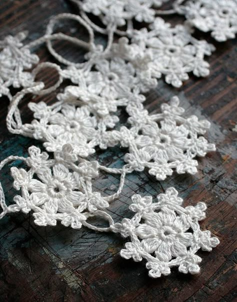 ~ crocheted snowflake garland Crochet Snowflake Garland, Crocheted Garland, Crocheted Motifs, Crochet Garlands, November Projects, Doily Bunting, Crochet Bunting, Crochet Garland, Snowflake Garland