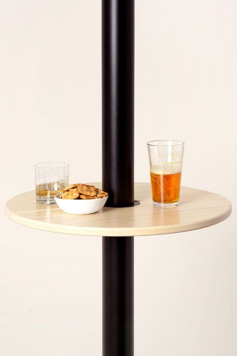 Give that hideous support pole in the basement something else to do besides just holding up the entire house, when you wrap this cool new Basement Pole Bar Table around it to transform it into a spot to gather. Basement Support Pole Ideas, Basement Pole Wrap, Basement Craft Rooms, Basement Poles, Pole Wrap, Toilet Paper Storage, Basement Makeover, Uncommon Goods, Mini Table